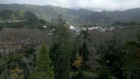 revealing aerial of furnas town in são miguel island, azores, portugal