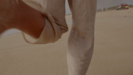 person running on the beach