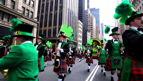 st. patrick's day parade with marching band playing saxophones