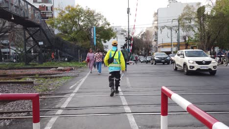transit police walks in argentine buenos aires train station with city traffic