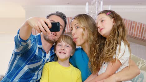 happy family taking selfie