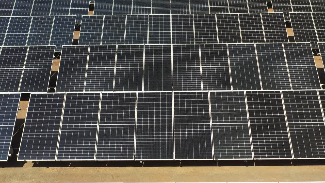 drone over the solar panels photovoltic solar panels, solar battery panels, solar panel,potovoltic, alternative.4k video