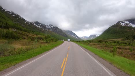 Vehicle-point-of-view-Driving-a-Car-VR-Caravan-travels-on-the-highway.-Tourism-vacation-and-traveling.-Beautiful-Nature-Norway-natural-landscape.