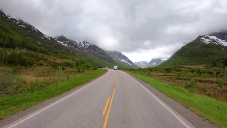 vehicle point-of-view driving a car vr caravan travels on the highway. tourism vacation and traveling. beautiful nature norway natural landscape.