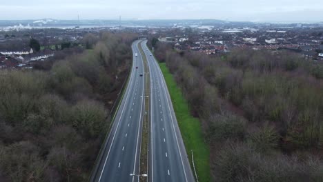 a557 rainhill runcorn widnes expressway aerial view down british highway rising pull back