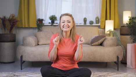 Woman-clapping-excitedly-to-camera.