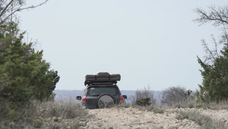 Off-road-4WD-vehicle-driving-on-remote-country-dirt-track