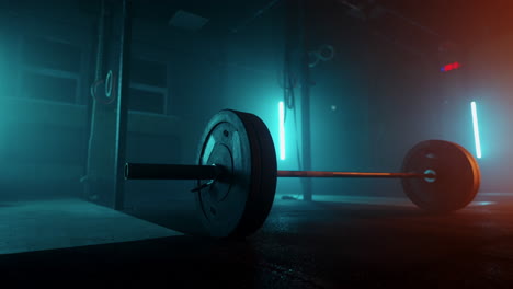 barbell-on-floor-in-dark-sports-hall-for-training-of-bodybuilder-and-powerlifter
