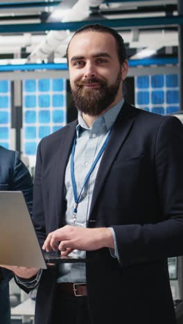 vertical video team of diverse analysts consultants reviewing data and checklists