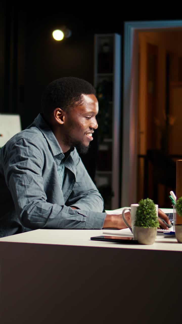 Man Working at Desk in Office