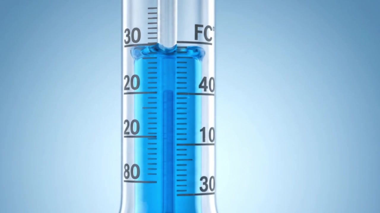 En detaljert titt på et temperaturmåleinstrument, som fanger det funksjonelle designet og den presise kalibreringen av et termometer i ulike bilder.