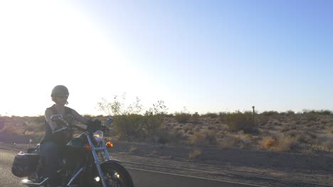 woman motorcyclist with dog