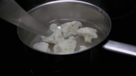 Sharp-knife-checking-to-see-if-the-cauliflower-is-cooked