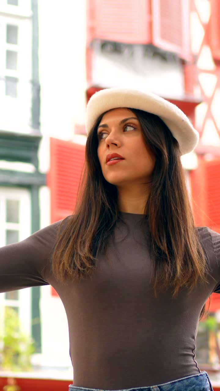 Woman in Beret Smiling Outdoors