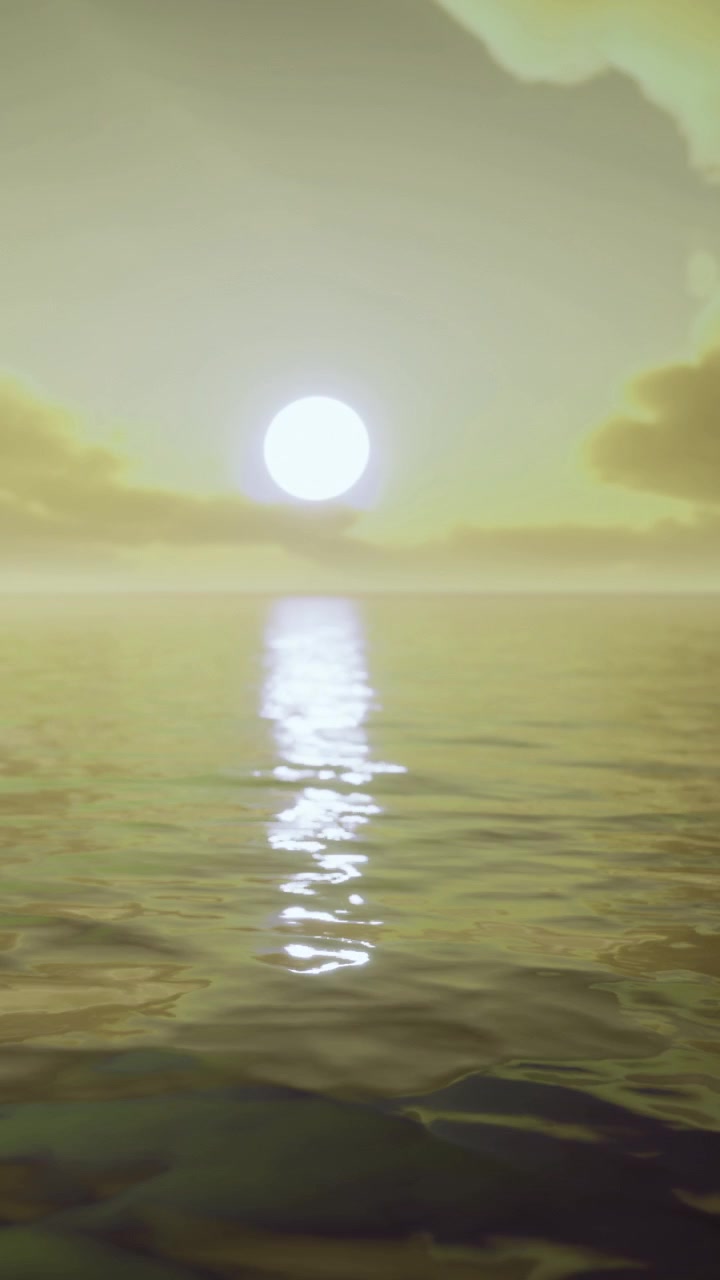Sunset over calm ocean with reflections and soft clouds in the sky