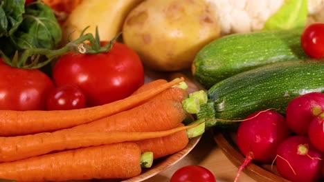 assorted vegetables arranged on a white background