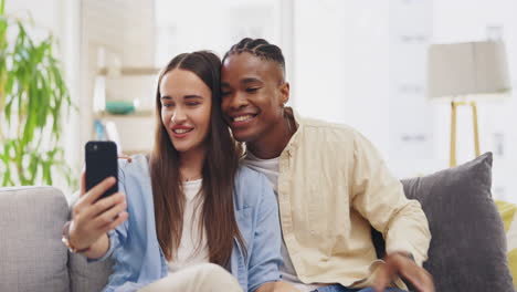 Peace-sign,-selfie-and-couple-kiss-in-home