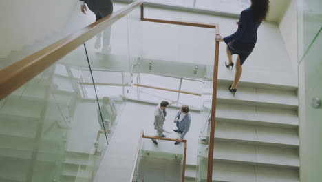 business people in modern office staircase