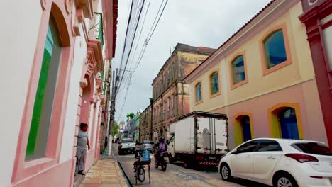 colorful street scene in a historic south american city