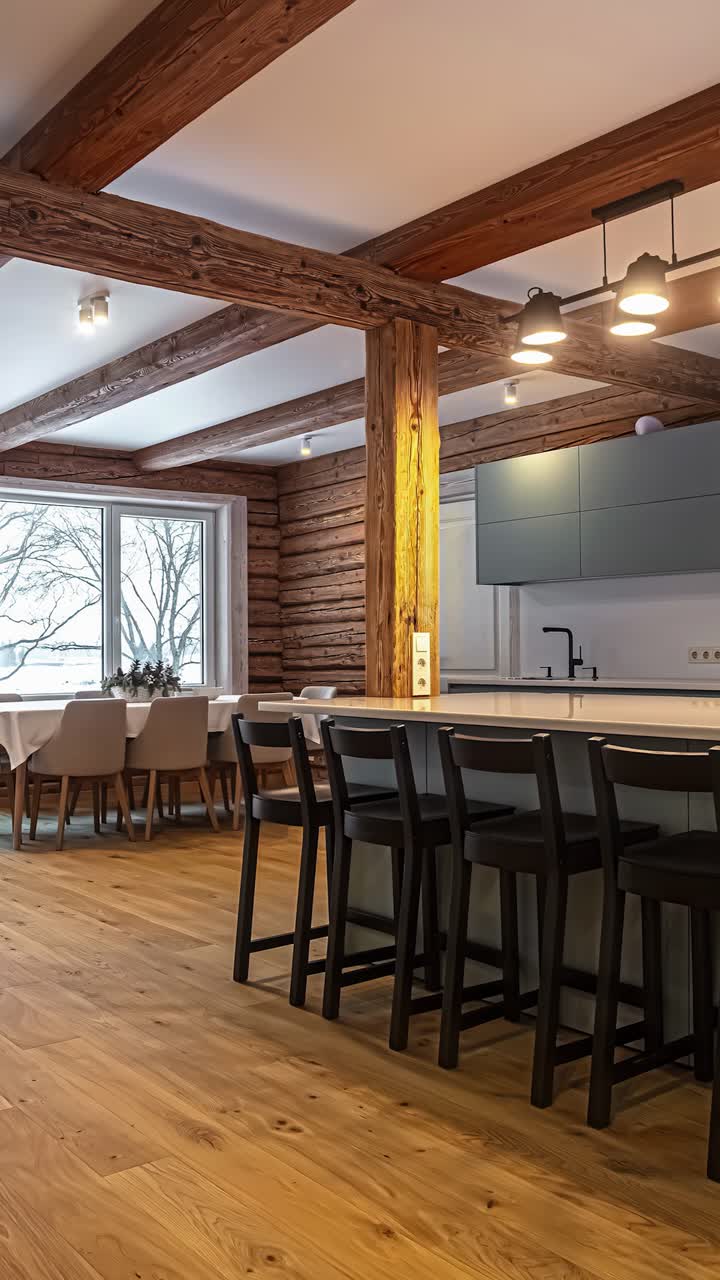 Modern kitchen interior with wooden beams and island seating