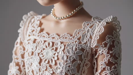 elegant lace dress with pearl necklace