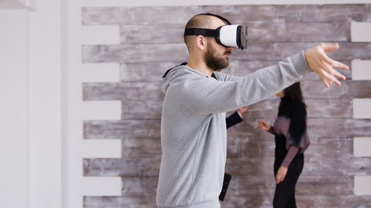 Man Using VR Headset During a Business Meeting