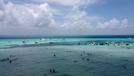 A-tilt-up-shot-of-a-beautiful-swimming-location-for-tourists-at-Isla-Mujeres-in-Cancun-Mexico