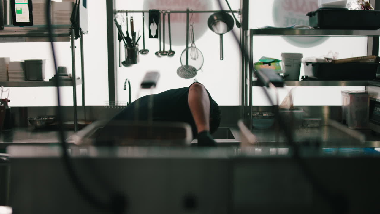 Commercial Kitchen Scene with Chef