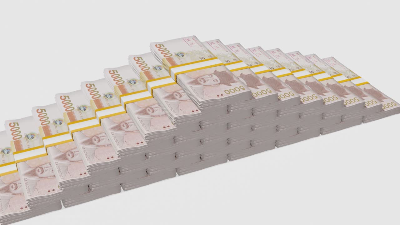 Many wads of money. 5000 South Korean Won banknotes. Stacks of money.