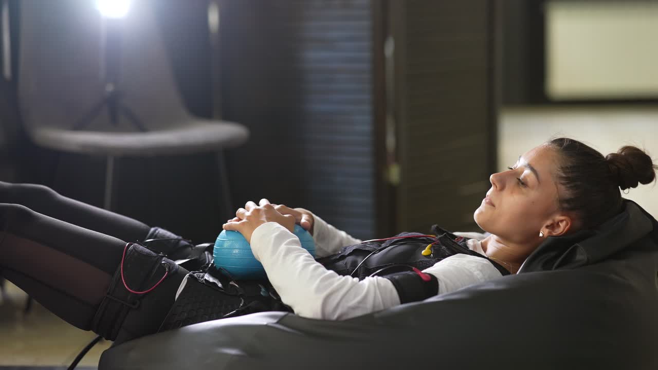 Woman resting after EMS training