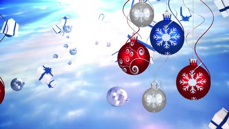 Animation-of-red,-blue-and-grey-christmas-tree-balls-over-falling-presents-on-blue-background