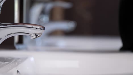 Washing-female-hands-throughly-with-liquid-soap,-close-up