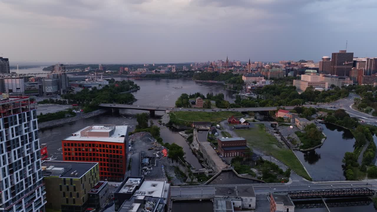 Cinematic aerial footage of the Zibi Community looking towards Albert Island and Victoria Island in Ottawa, Capital of Canada, Drone