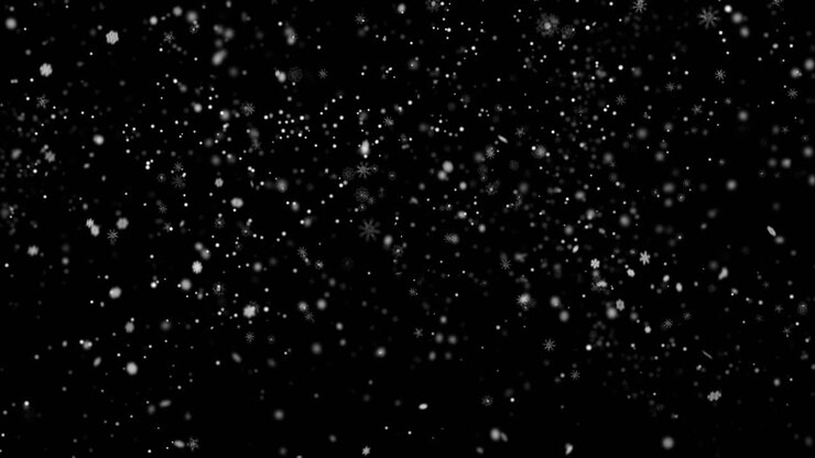 снег падает на черный и зеленый фон