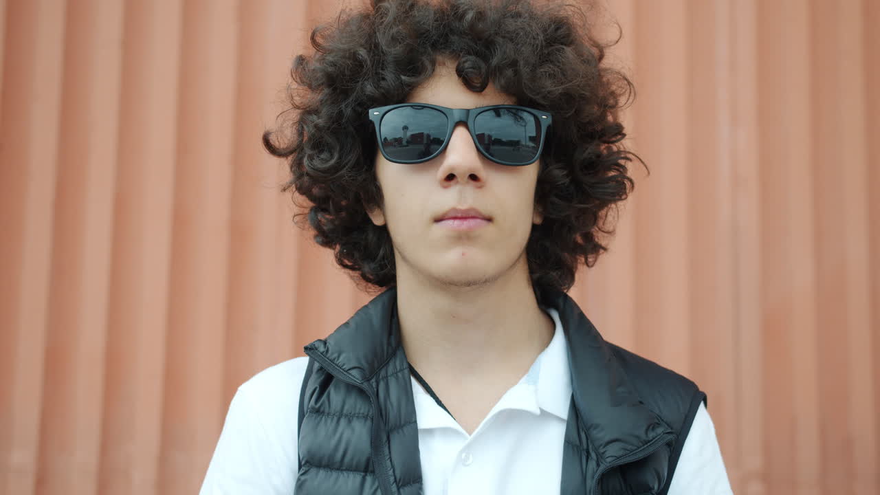 Teenage boy wearing sunglasses