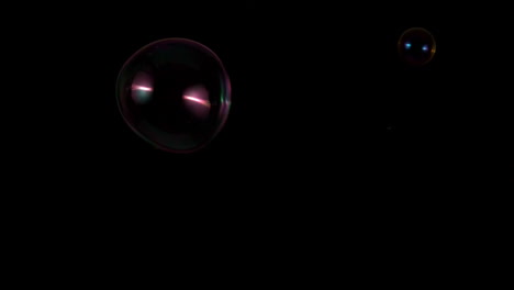 Bubbles-floating-on-black-background