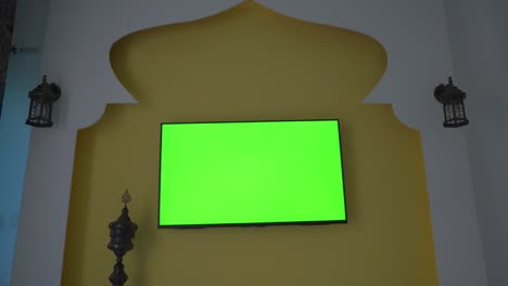 wall with tv and green screen in the style of the middle east and north africa. arab cup in qatar