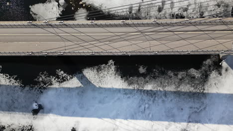 aerial top down view of icy sea bridge in the arctic climate