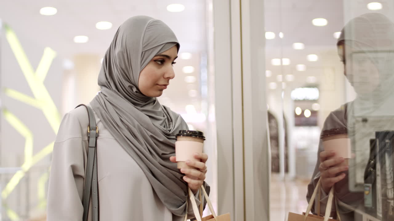 Woman in Hijab Shopping in a Mall