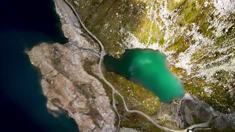 Incredible-emerald-green-waters-of-Swiss-mountain-lake-in-Switzerland-in-summer-season