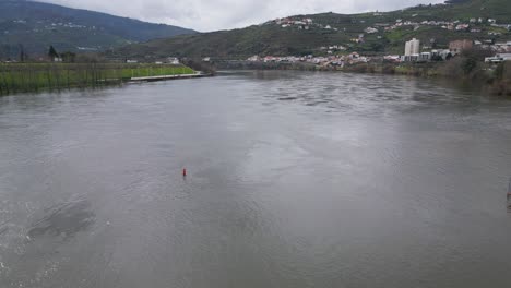 Expansive-Douro-River,-Peso-da-Régua,-Portugal---aerial-fly-over