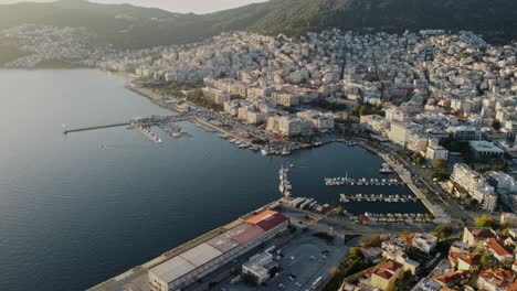 aerial view of the city kavala in northern greece demonstrating the harbour, the old fortress the breakwater and the rocky seasides