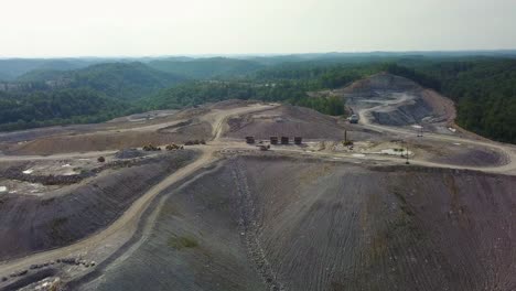 an aerial over a mountaintop removal coal strip mine in west virginia 1