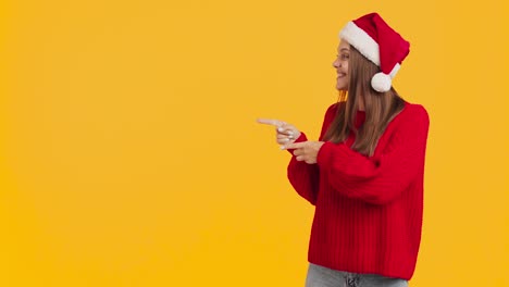 woman in santa hat and red sweater