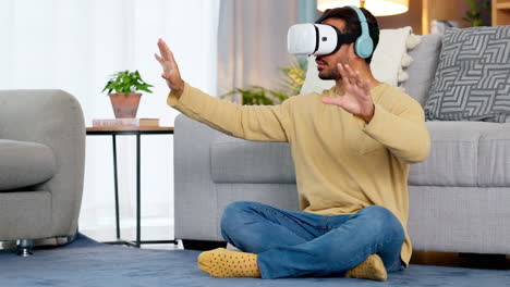 Male-gamer-using-a-VR-headset-to-access