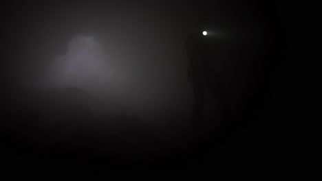 foggy mountain hike at night