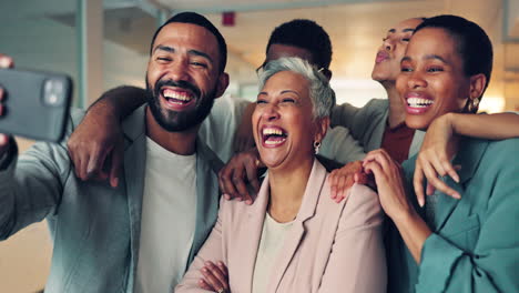 group of business people in fun selfie together