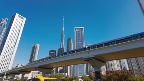 dubai cityscape with burj khalifa and metro