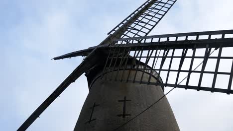 bidston hill vintage countryside windmill flour mill english landmark low angle shot dolly left slow