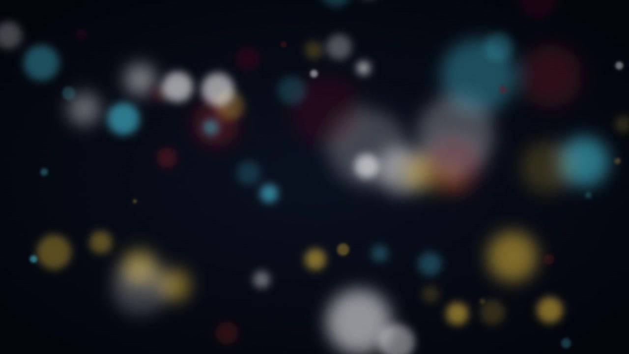 Sfondo astratto con particelle di luce bokeh colorate fluttuanti